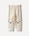Jogger Caqui Dise&ntilde;o,CREMA